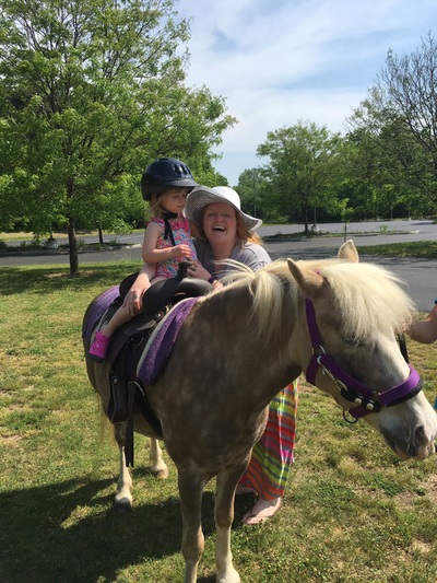 day care friend riding horse