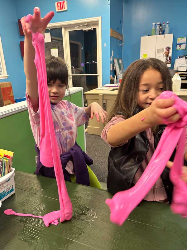 children playing with goo at weekend fun program